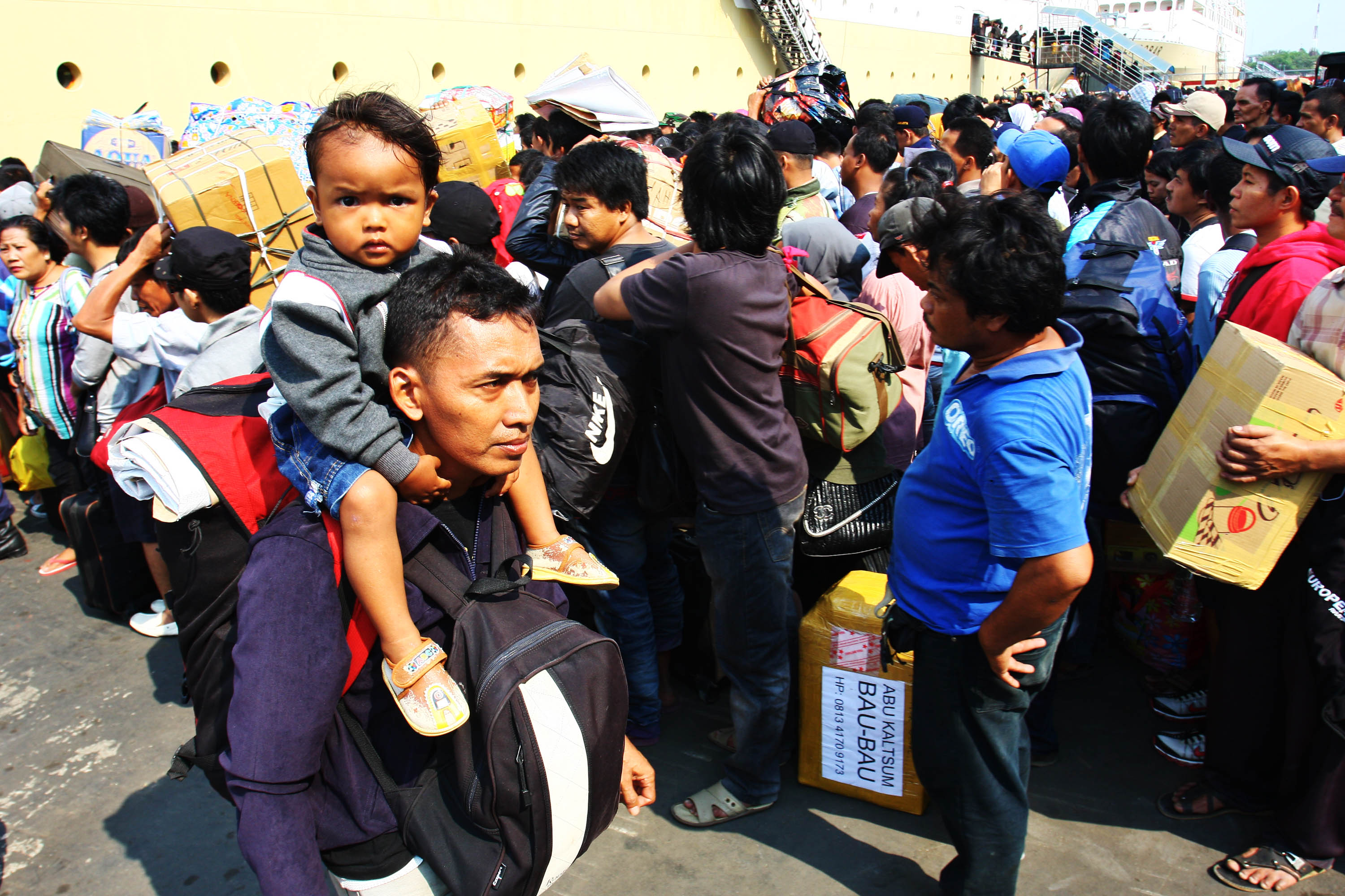 Thousands of people queueing at Tanjung Priok harbor, Jakarta, By: Iwan- Denaya Images