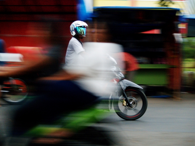 a different kind of panning shot. foreground and background are moving. I took this photo at Gunung Putri, Bogor, West Java