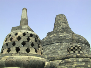 Stupas at Borobudur site marking the Hill of Statues, By: Anthony Beyeler