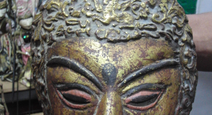 Antique mask from Madura with an ornamental flying horse