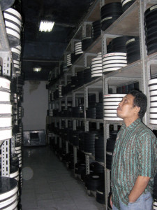 Hartono, head of film maintenance division, in the storage room