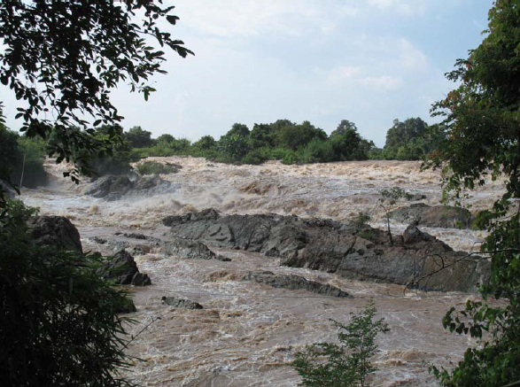 The impassable Somphamit Rapids halted upriver passage, By: Rik Ponne  