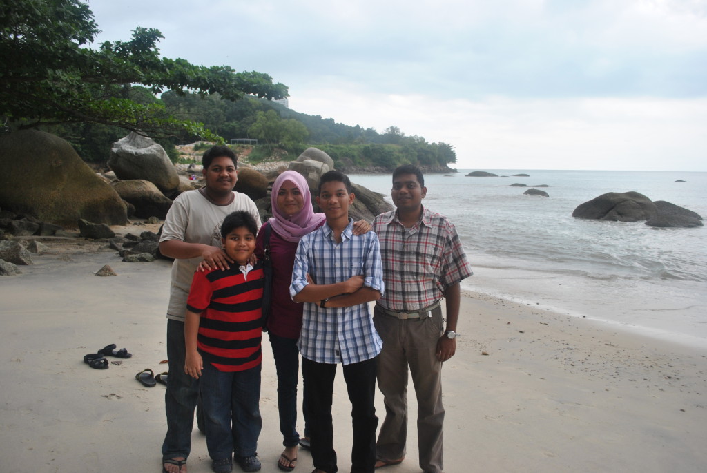 Muhammad and siblings on the beach